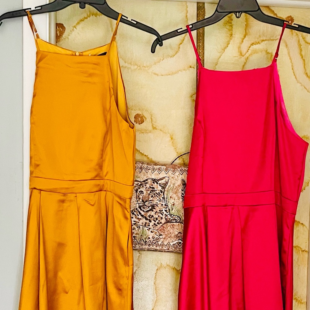 Two pretty as they come bridesmaids dresses in lovely jewel colors!